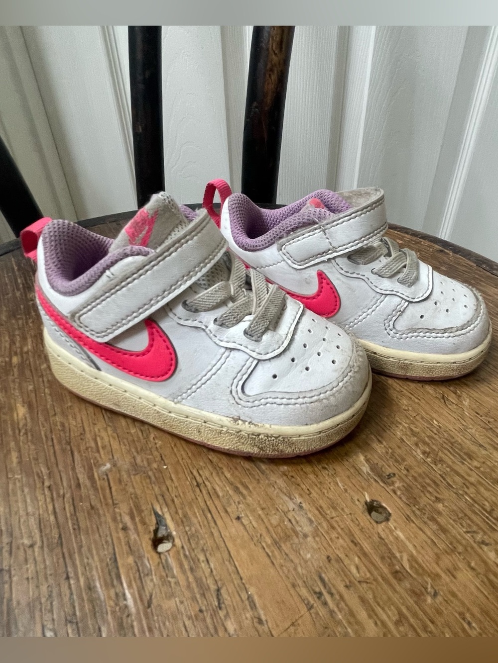Nike Kids White Sneakers with Pink Swoosh